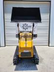 AGT CRT23 mini skid steer from the rear: perforated engine hood, black bucket on the loader arms and rubber tracks