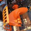 GIYI trencher spoil auger: orange flighting bolted beside the digging chain and slotted side guard