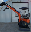 Orange ATS-ME18 mini excavator with the boom extended, open canopy, rubber tracks and dozer blade