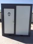 Portable restroom exterior door, white panel with RESTROOM sign, dark charcoal frame and stainless lever handle
