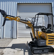 MX12RX 1-ton mini excavator with the boom reached out, toothed bucket raised and the mechanical thumb open