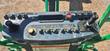 JLG platform control panel close-up with joystick and emergency stop