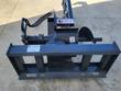 JCT hydraulic trencher front view with quick-attach base, hydraulic rotator, spoil auger, and crumber arm.