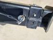 Forklift jib boom joint: spring-clip stop pin on a chain, grease fitting and bolted collar