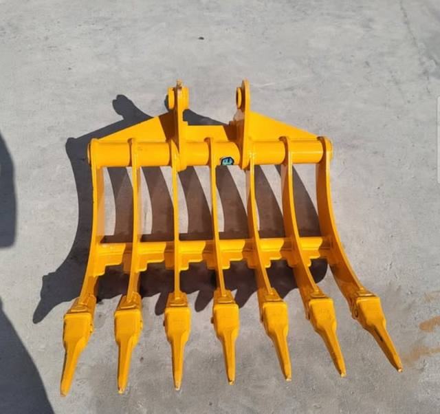 Yellow 32-inch excavator rake with seven teeth, mounting ears at the top and a cross bar
