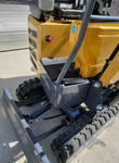 MX12RX mini excavator front end: diamond-plate step, red shutoff lever, boom swing bracket, backfill blade and cylinder