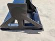 Forklift jib base: black steel square tubing with triangular gusset plates and hex mounting bolts