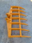 Yellow 46-inch excavator rake at an angle, curved tines fanned out and twin pin-boss mounting ears