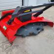 Red disc mulcher: steel cutting disc with bolt-on teeth under the red hood, quick-attach arms and 30-45 GPM decal