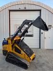 CFG Industrial KJT27 mini skid steer with loader arm raised and bucket lifted overhead
