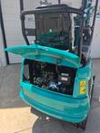 KT13R mini excavator engine bay under the raised hood, air filter housing and fuel tank
