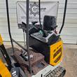 CFG XZ20R mini excavator seat and joystick console, folding armrests, foot pedals and mesh-vented engine cover