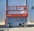 Skyjack SJIII 3226 scissor lift, platform lowered, front view, tag MC