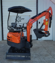 Orange ATS-ME18 mini excavator: black canopy, rubber tracks, dozer blade, bucket with hydraulic thumb
