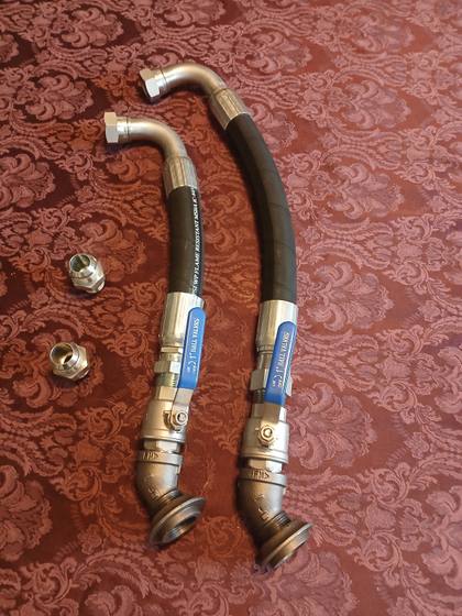 Two hydraulic suction hoses with 1 in ball valves, 90-degree swivel ends, tank flanges and two adapters