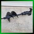 Black hydraulic auger drive with 16-inch two-flight bit, shaft and quick-attach mounting bracket