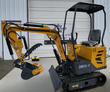 AGT DM12-C mini excavator: yellow open-canopy machine with hydraulic thumb, digging bucket, backfill blade and rubber tracks