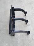 Three-tooth ripper on its side: mount plate, cross bar and three curved shanks with square boot tips