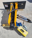Wolverine 750 hydraulic hammer with two spare chisel bits, hose kit, and tool box