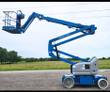 Blue Genie articulating boom lift, boom raised and extended with the work platform out front at head height