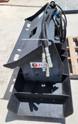 JCT vibratory plate compactor from above: quick-attach couplers, bundled hoses and JCT label on the steel frame