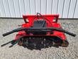 Red disc mulcher on a pallet, cutting disc with replaceable carbide teeth and hydraulic drive motor