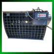 JCT concrete mixer with mesh drum, hydraulic motor, and hose connections