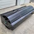 GIYI vibratory roller attachment: wide steel drum in a black frame with a pillow block bearing at the drum end