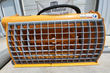Yellow Landhonor concrete mixer drum face-on: mesh discharge grille and mixing paddles visible inside