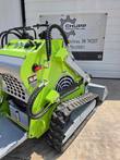 ATS T460 stand-on mini skid steer rear view: twin joystick controls, hydraulic hoses and rubber track