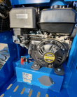 AGT MX-MRW14 engine bay: 420cc gasoline engine with air cleaner, red fuel shutoff valve and AGT nameplate