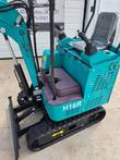 CFG H16R mini excavator, close-up of operator seat, joystick controls, and dozer blade