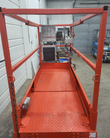 Scissor lift platform interior, controls box and entry chain, deck floor