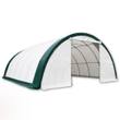 White fabric building with green trim, roll-up door raised to show truss interior