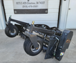 Arteer 72-inch soil conditioner, rear view with caster wheels, rake tines, and hydraulic hoses