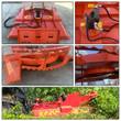 TopCat 68in brush cutter details: hydraulic drive motor, serrated deck skirt, blade underside, cutting brush in the field
