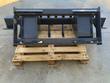 Ripper bar from the back: skid steer quick-attach mounting plate, welded gussets and the shank toolbar