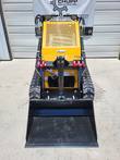 AGT CRT23 head-on: wide black bucket, loader arms, red-capped auxiliary couplers and perforated engine hood