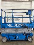 Genie GS-2632 scissor lift, platform lowered, front view, tag G166