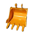 Yellow 24-inch excavator bucket, four bolt-on teeth, side cutters and twin pin-boss mounting ears
