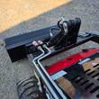 Future FT323TZ wheeled mini skid steer's boom pivot and hydraulic cylinder near the bucket linkage