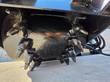 Rows of carbide cutting teeth on the asphalt planer's milling drum