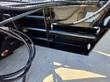 Hydraulic cylinder rods and bolt-hole bracket on the asphalt planer