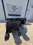Asphalt planer attachment's milling drum and hydraulic hose routing