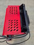 GIYI Mini Rock Rake, red perforated deck and black tine trough, hoses coiled at the corner mount