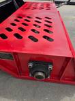 GIYI Mini Rock Rake's ID plate and hydraulic motor mount on the red frame corner