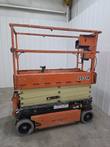JLG 1932R scissor lift, stowed, opposite side view with platform rails