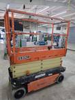 JLG 1932R scissor lift, side view in the Chouteau shop