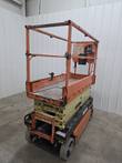 JLG 1932R scissor lift, entry end with platform gate