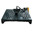 Gray hydraulic landscape rake, twin slotted hopper decks, spring-loaded center mount, yellow drive motor, teeth below
